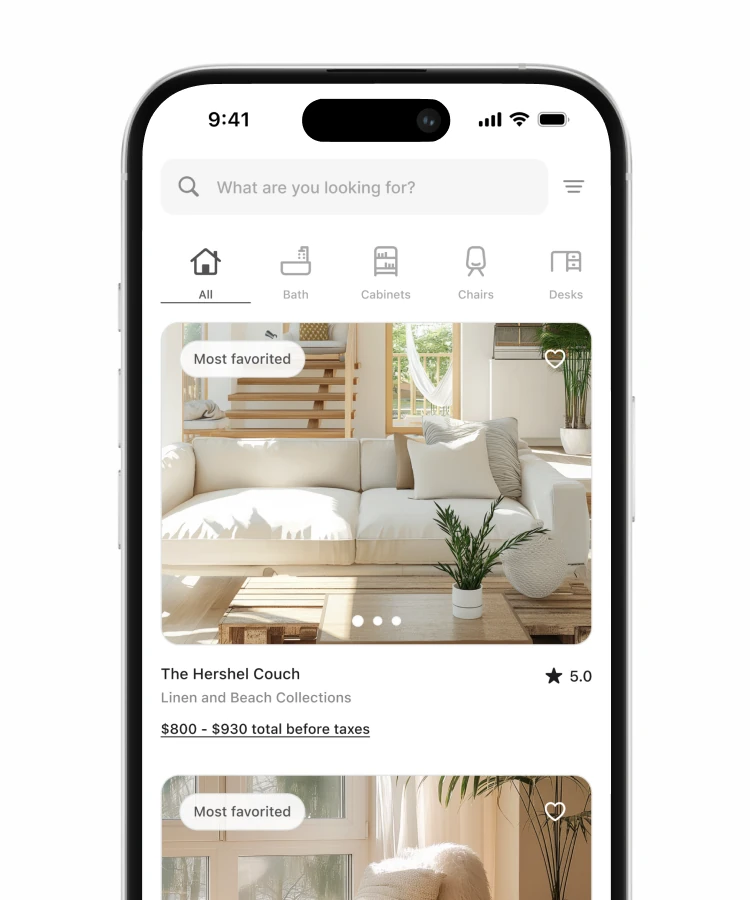 The CB2 app on a phone, browsing furniture by room with a most favorited sofa